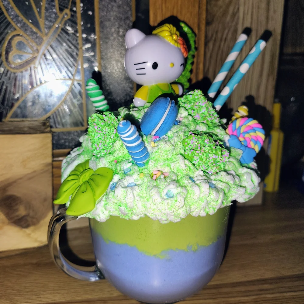 Colorful Character Cake Topper with Green and Blue Accents